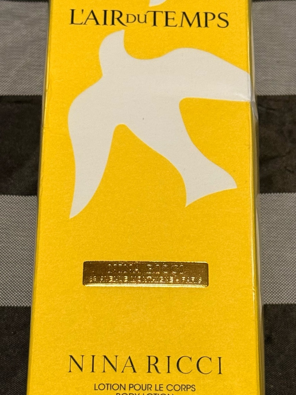 Nina Ricci Yellow Packaging Body Lotion Box